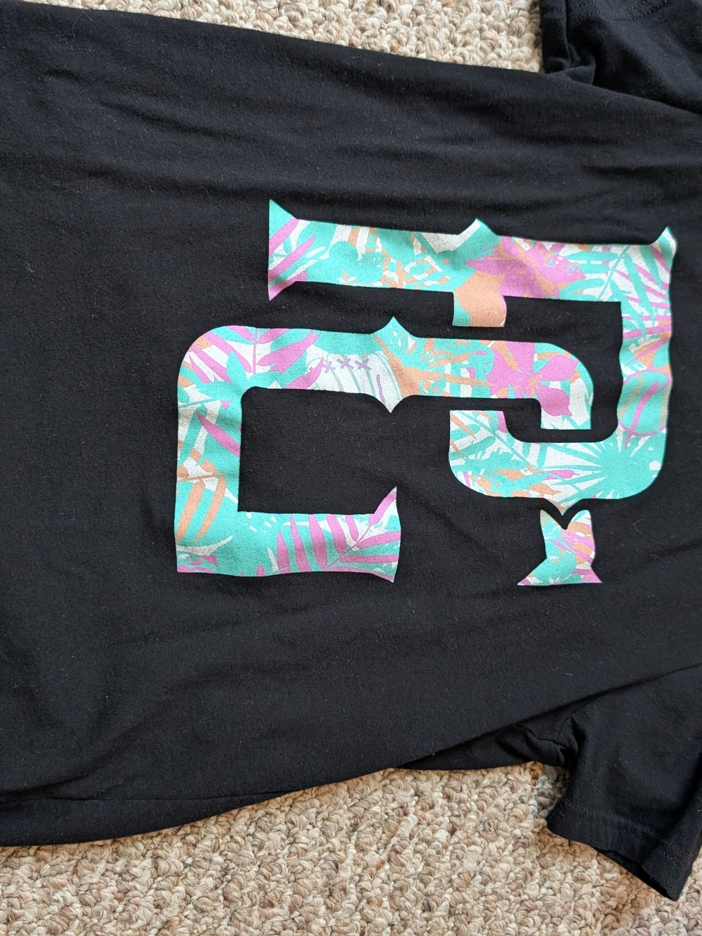 Kids Black Tee with Teal & Pink Tropical Logo